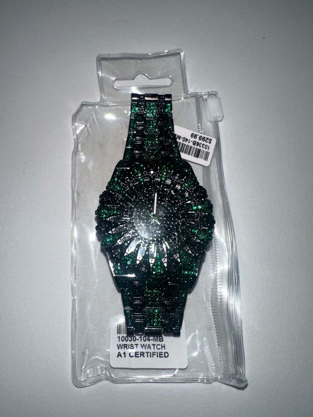 Green and black iced out wrist watch